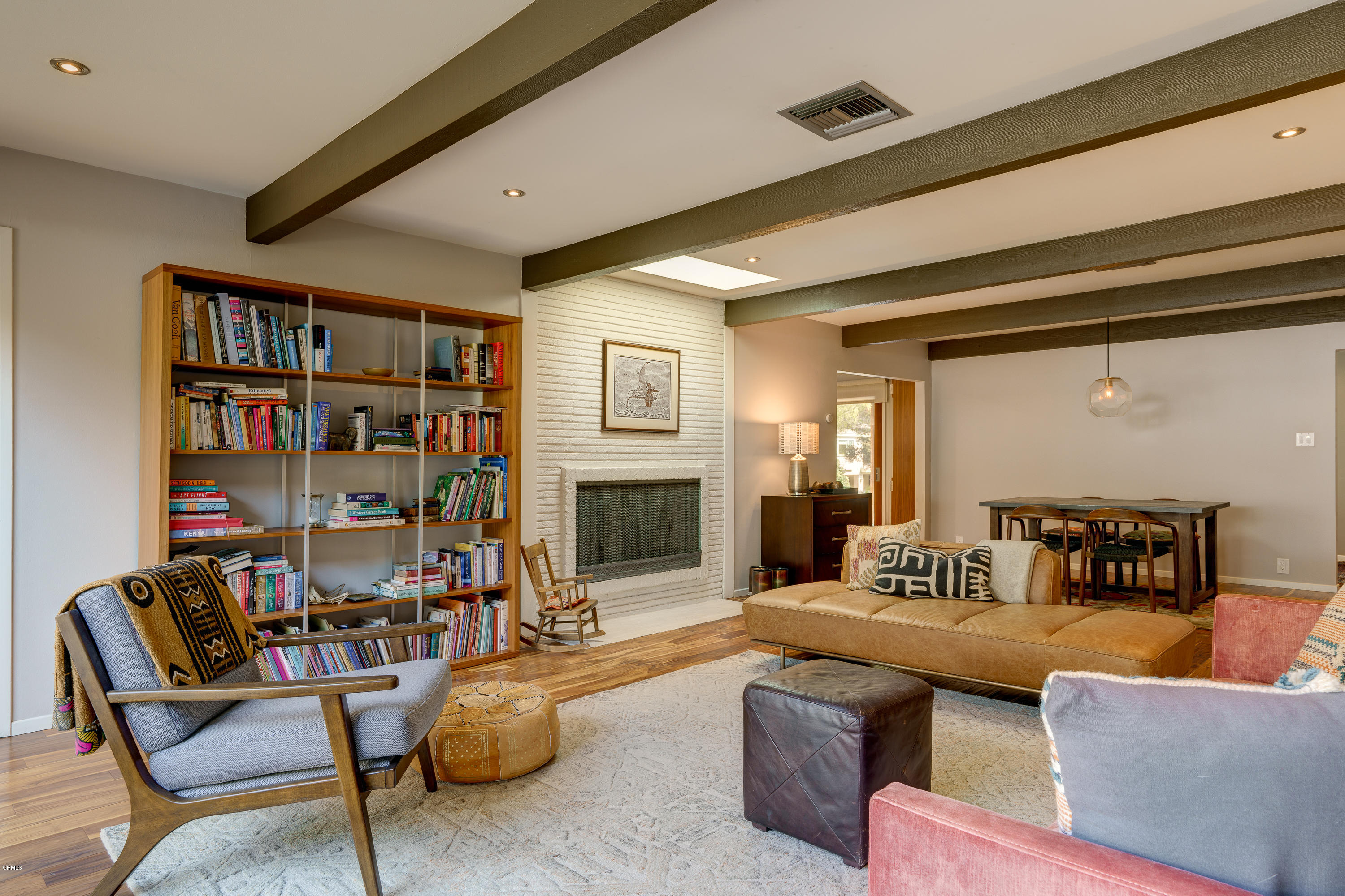 1025 Nithsdale Road Pasadena, CA 91105 - Photo 9 of 34 a living room with furniture and a book shelf