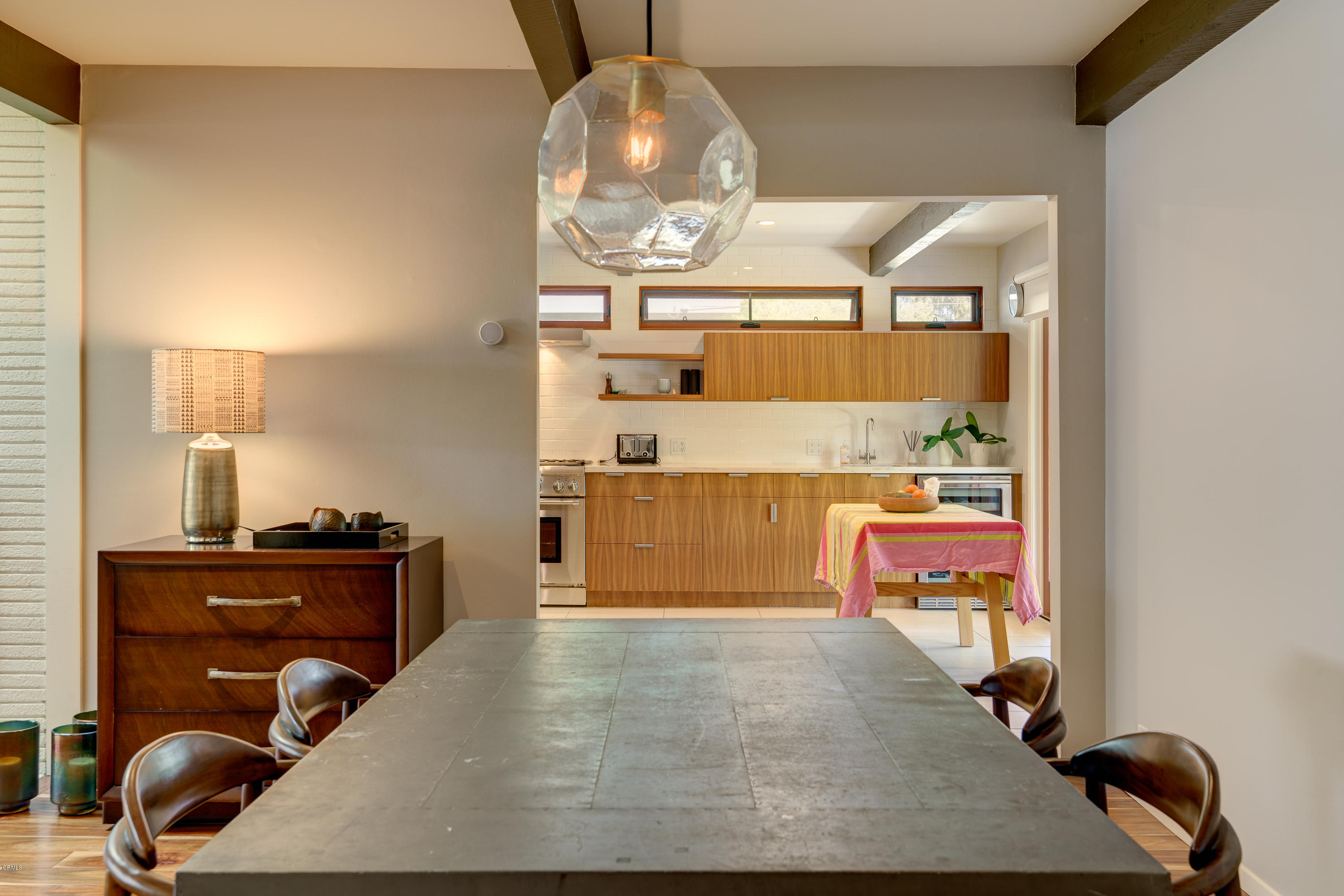 1025 Nithsdale Road Pasadena, CA 91105 - Photo 10 of 34 a room with a wooden floor and chandelier