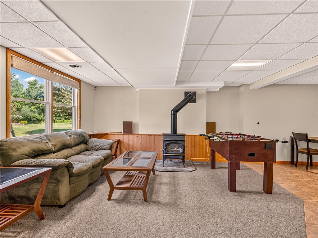 233 Dean Road Parma, NY 14559 - Photo 31 of 42 Walk-out finished basement with a gas fireplace ad