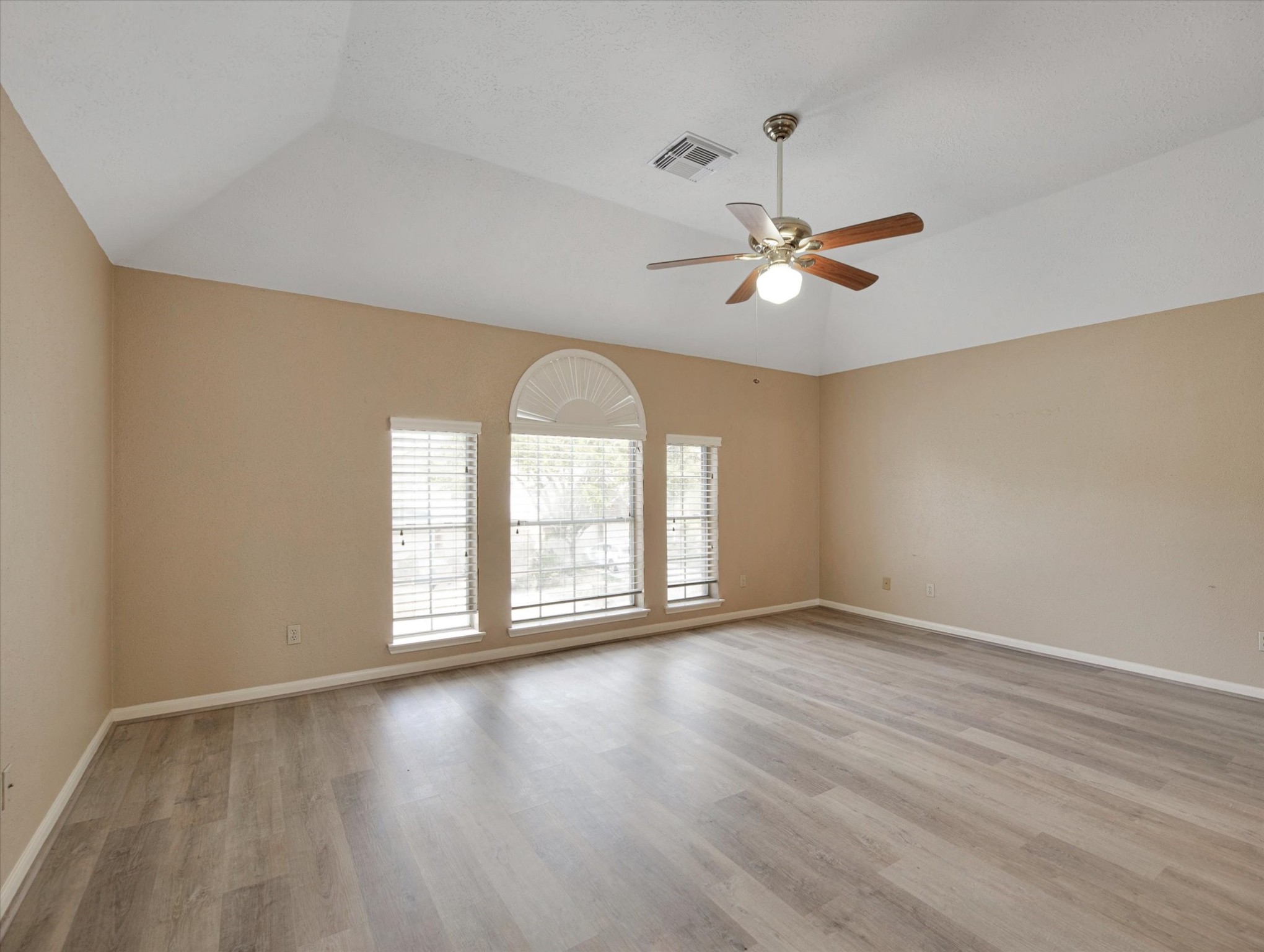 16423 Ash Point Lane Sugar Land, TX 77498 - Photo 26 of 46 an empty room with fan and windows