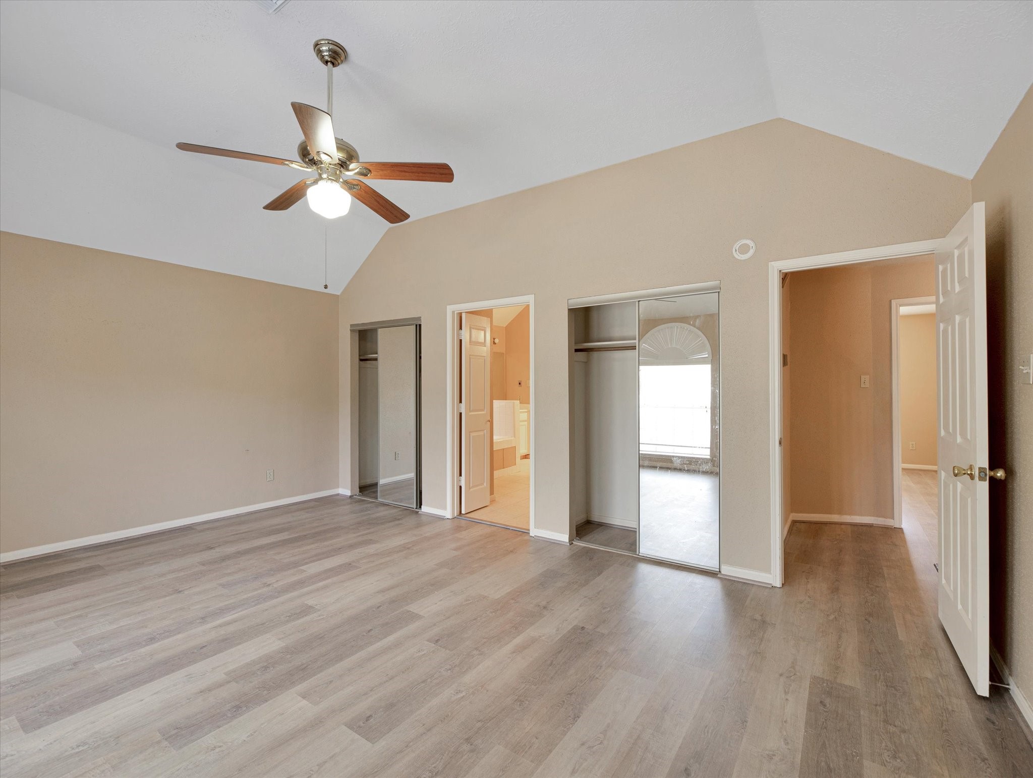 16423 Ash Point Lane Sugar Land, TX 77498 - Photo 27 of 46 a view of empty room with wooden floor and ceiling fan