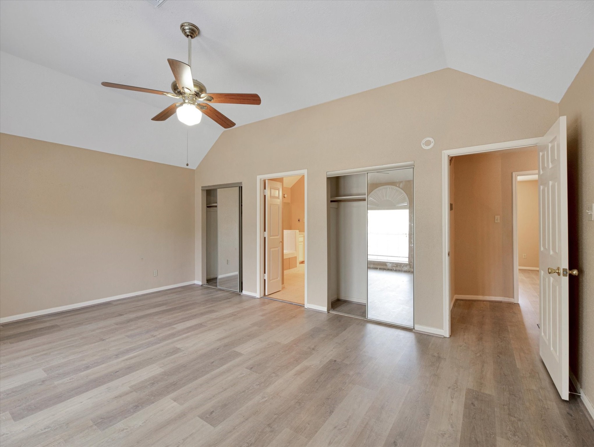 16423 Ash Point Lane Sugar Land, TX 77498 - Photo 27 of 46 a view of empty room with wooden floor and ceiling fan