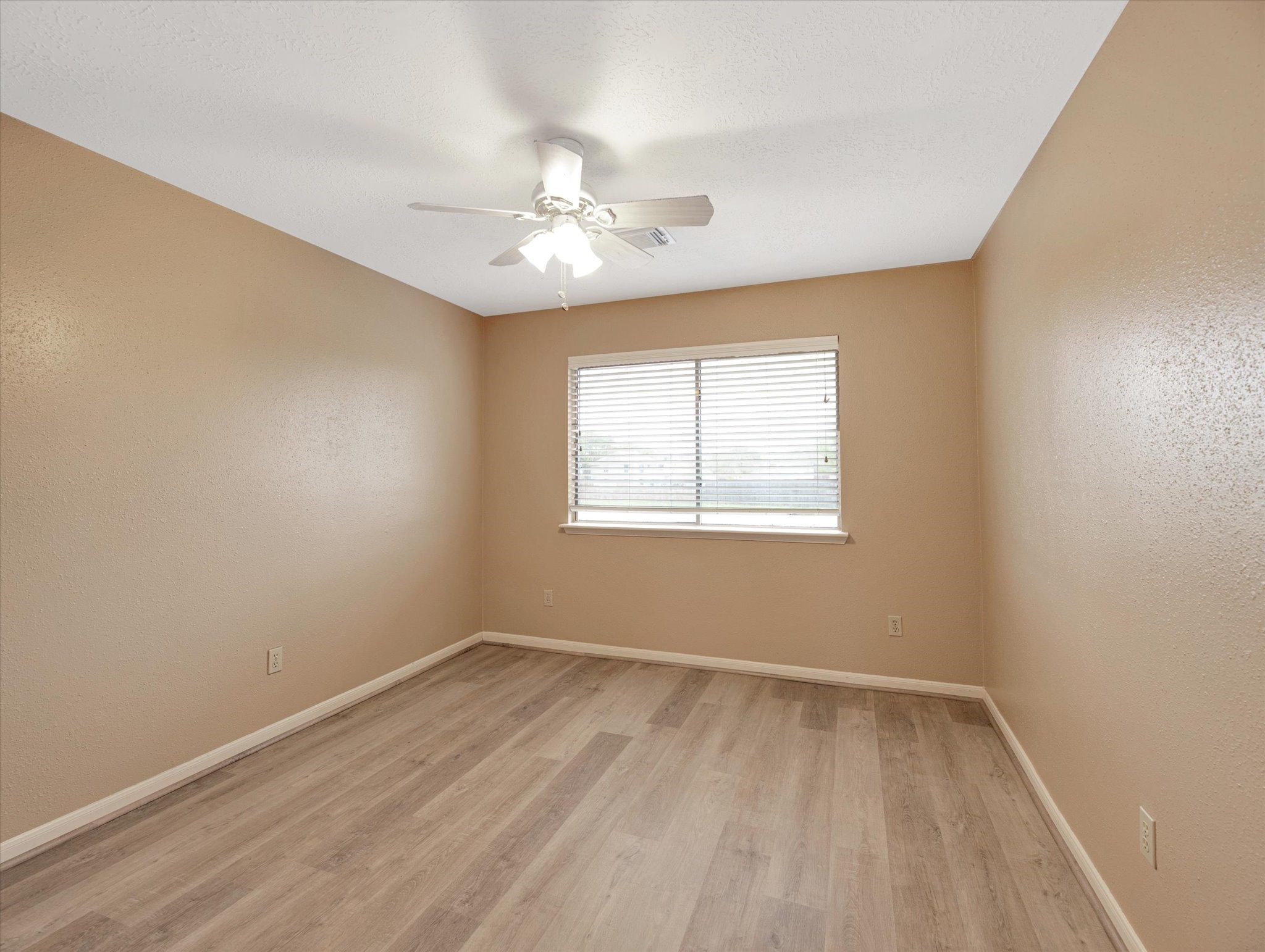 16423 Ash Point Lane Sugar Land, TX 77498 - Photo 34 of 46 an empty room with a window