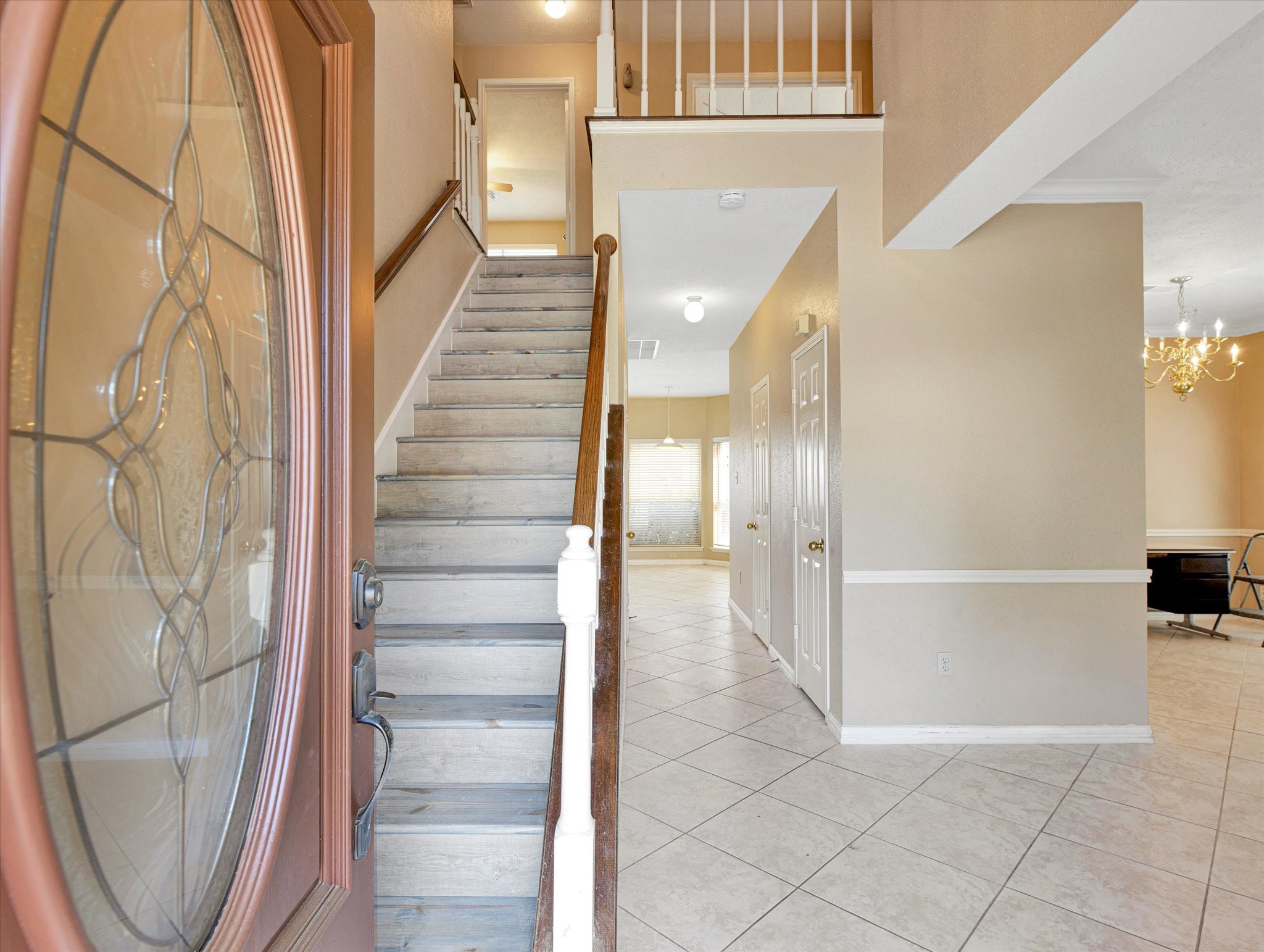 16423 Ash Point Lane Sugar Land, TX 77498 - Photo 5 of 46 a view of entryway and hall with wooden floor