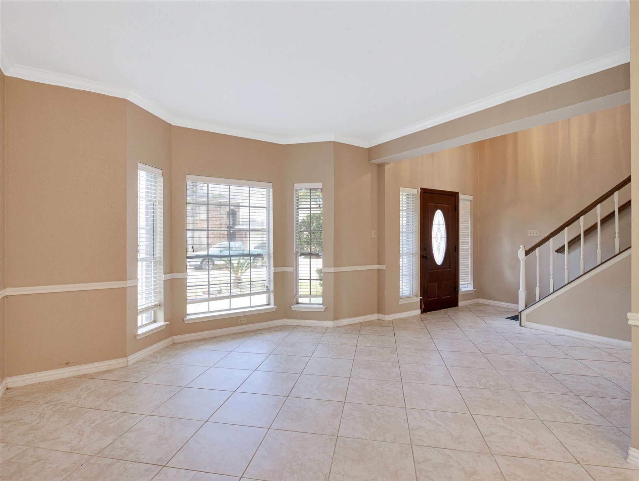 16423 Ash Point Lane Sugar Land, TX 77498 - Photo 9 of 46 a view of an empty room with a window