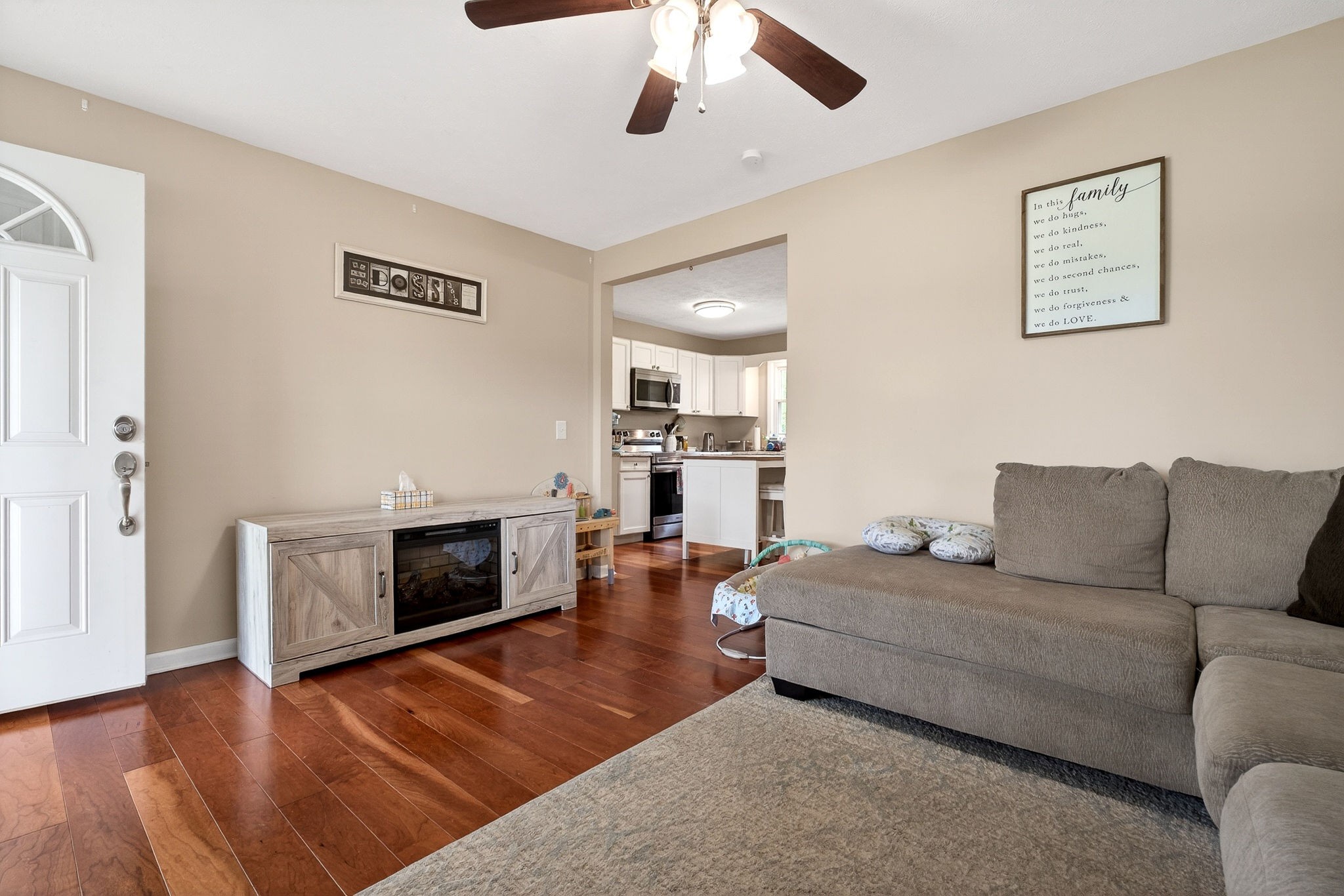 237 Armstrong Road Doyle, TN 38559 - Photo 12 of 34 a living room with furniture and a fireplace
