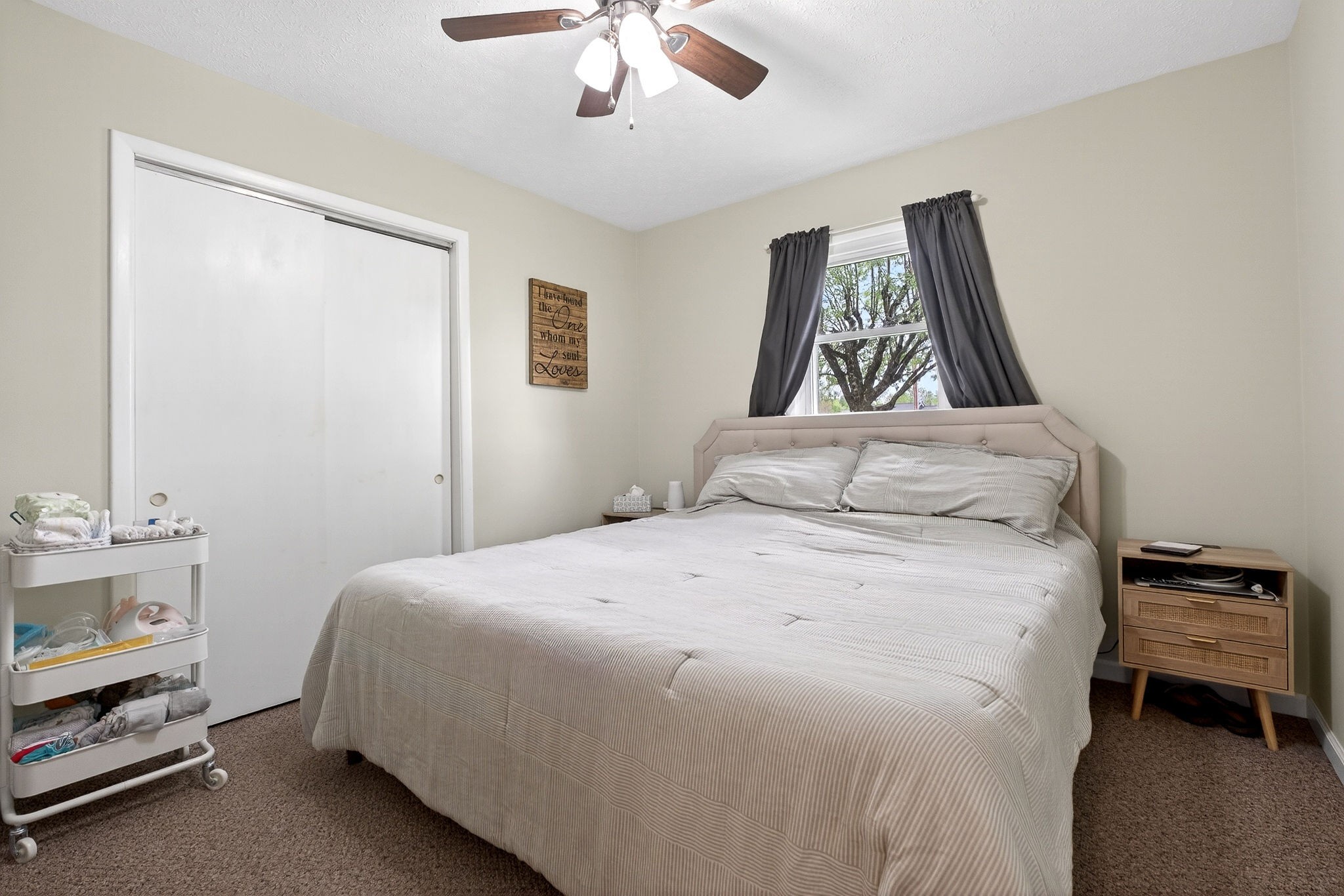 237 Armstrong Road Doyle, TN 38559 - Photo 31 of 34 a bedroom with a bed and a painting on the wall