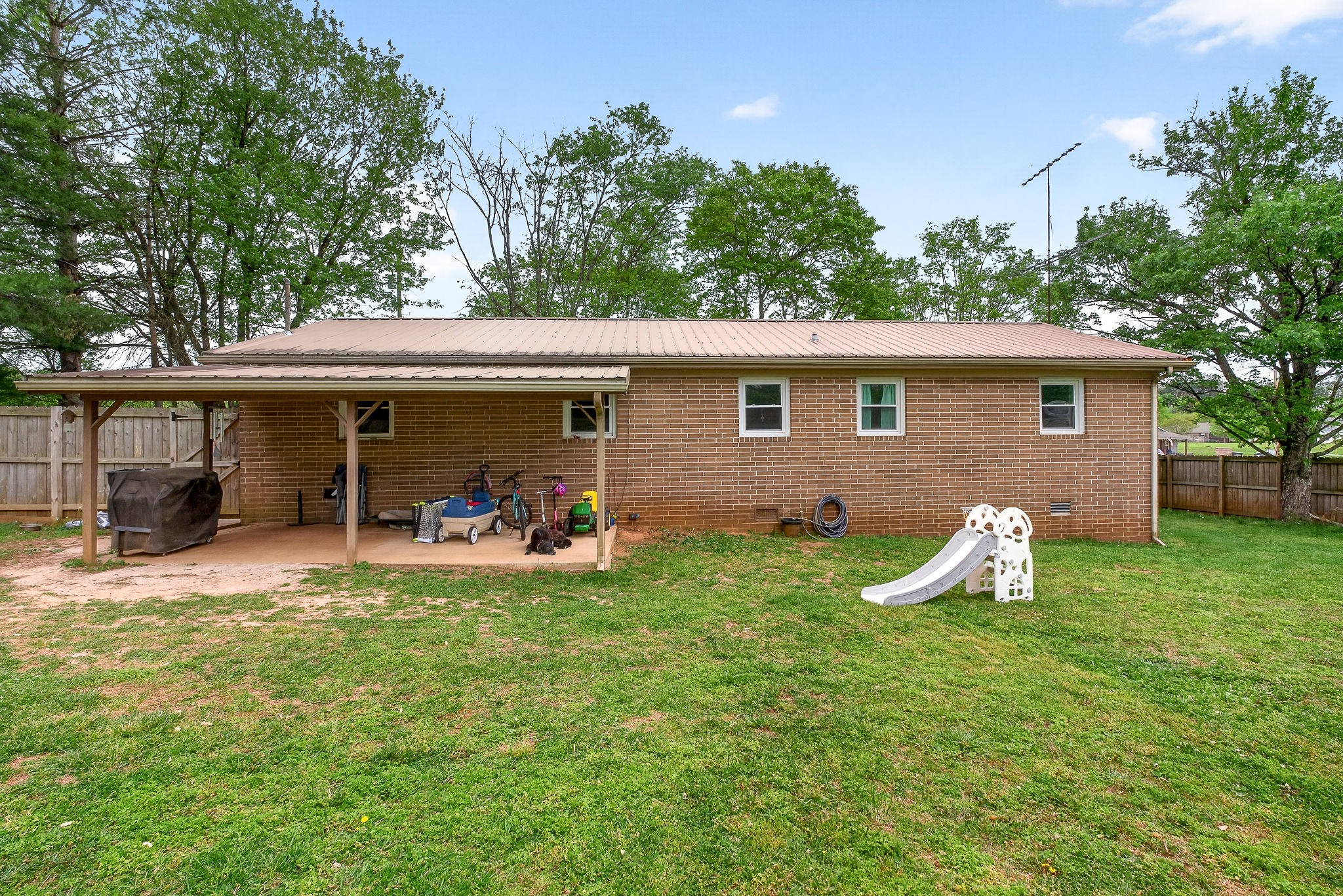 237 Armstrong Road Doyle, TN 38559 - Photo 34 of 34 a view of a house with backyard