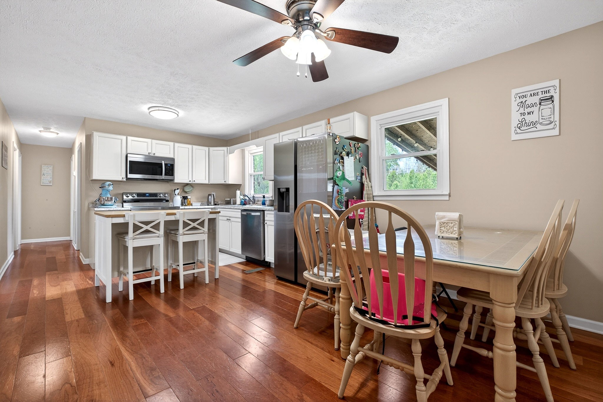 237 Armstrong Road Doyle, TN 38559 - Photo 6 of 34 a view of a dining room with furniture window and wooden floor