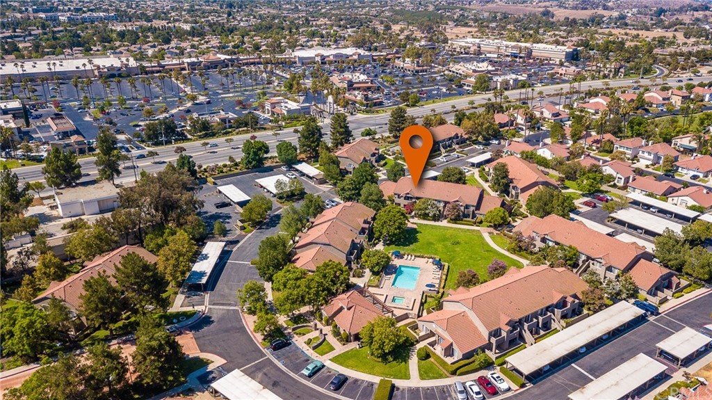 200 East Alessandro Boulevard, Unit 25 Riverside, CA 92508 - Photo 1 of 1 an aerial view of residential houses with outdoor space