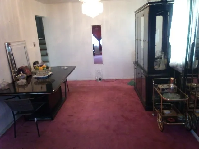 a room with furniture and a flat screen tv