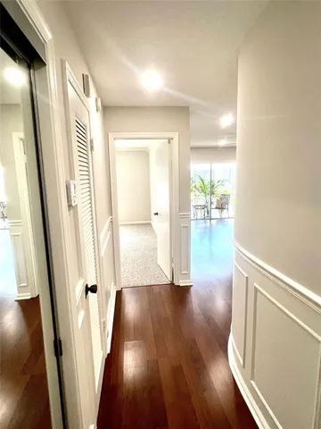 a view of entryway with wooden floor