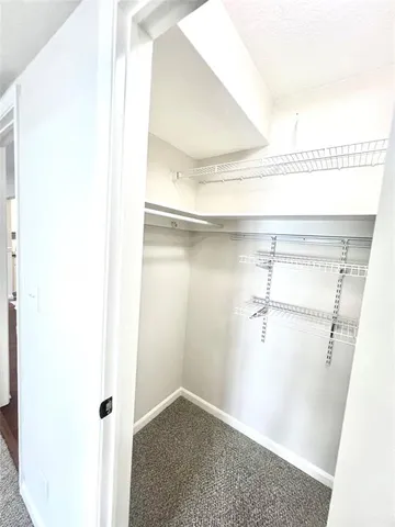 a view of a walk in closet