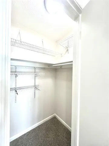 a view of small space with racks on the wall