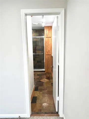 a view of storage and utility room