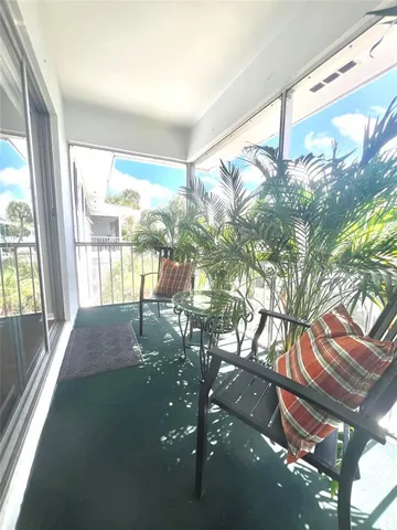 a room with yard and outdoor seating