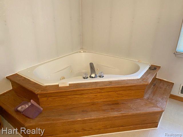 165 East Barnes Road Fostoria, MI 48435 - Photo 6 of 25 primary bathroom
