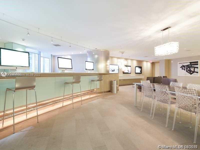 92 Southwest 3rd Street, Unit 1412 Miami, FL 33130 - Photo 23 of 37 a room with lots of table chair and view of living room