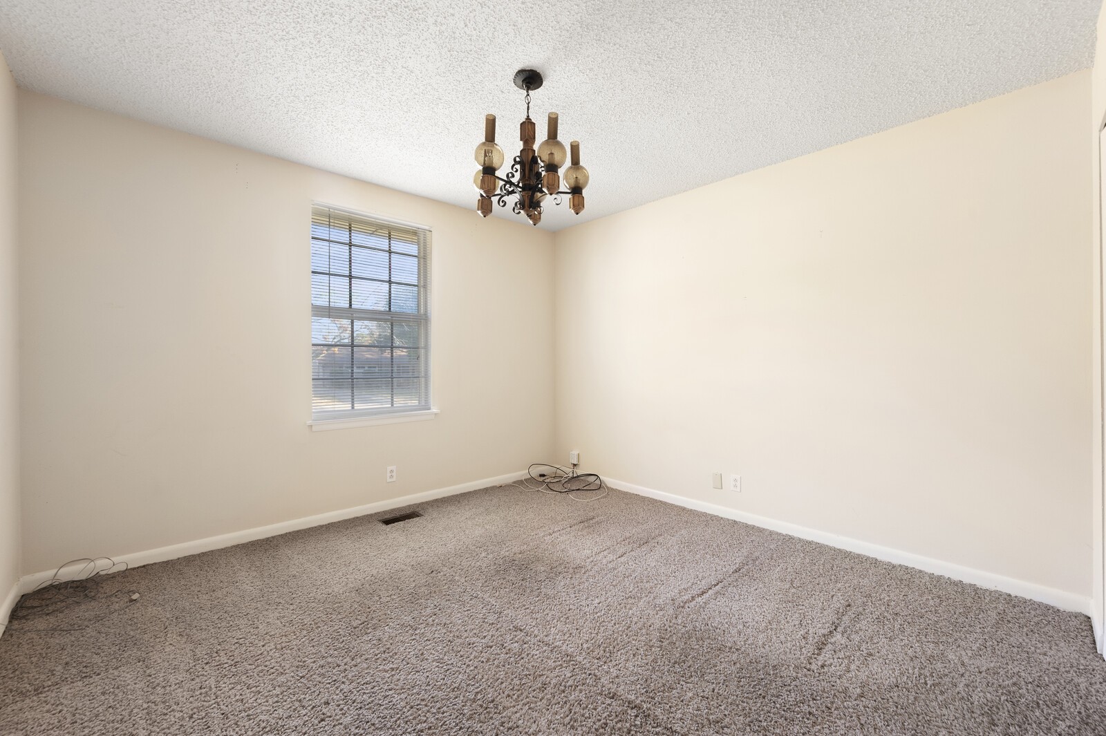 2911 Anderson Road Nashville, TN 37217 - Photo 7 of 14 an empty room with windows and chandelier fan