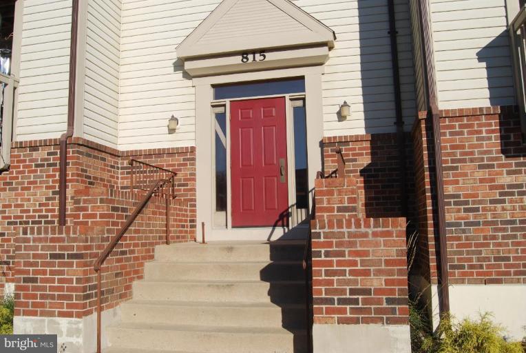 815 Stratford Way, Unit M Frederick, MD 21701 - Photo 2 of 3 a front view of a house