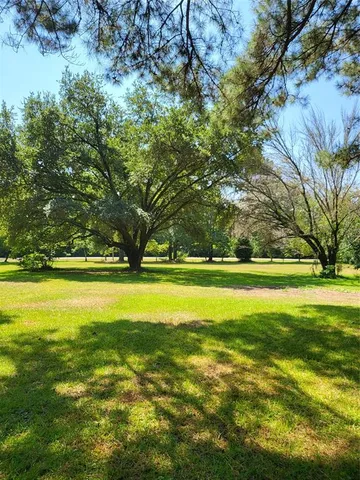 a view of swimming pool with an outdoor space and seating area