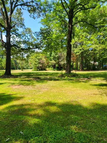 a view of an outdoor space and a yard