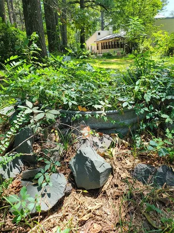 a view of outdoor space and yard