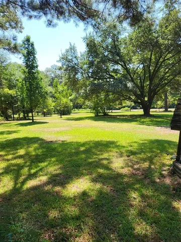 a view of an ocean with a building in the background