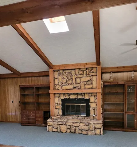 a living room with a fireplace