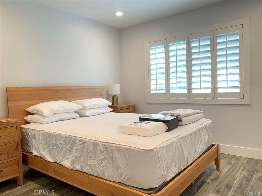 16264 Sierra Ridge Way Hacienda Heights, CA 91745 - Photo 12 of 14 a bedroom with a bed and window