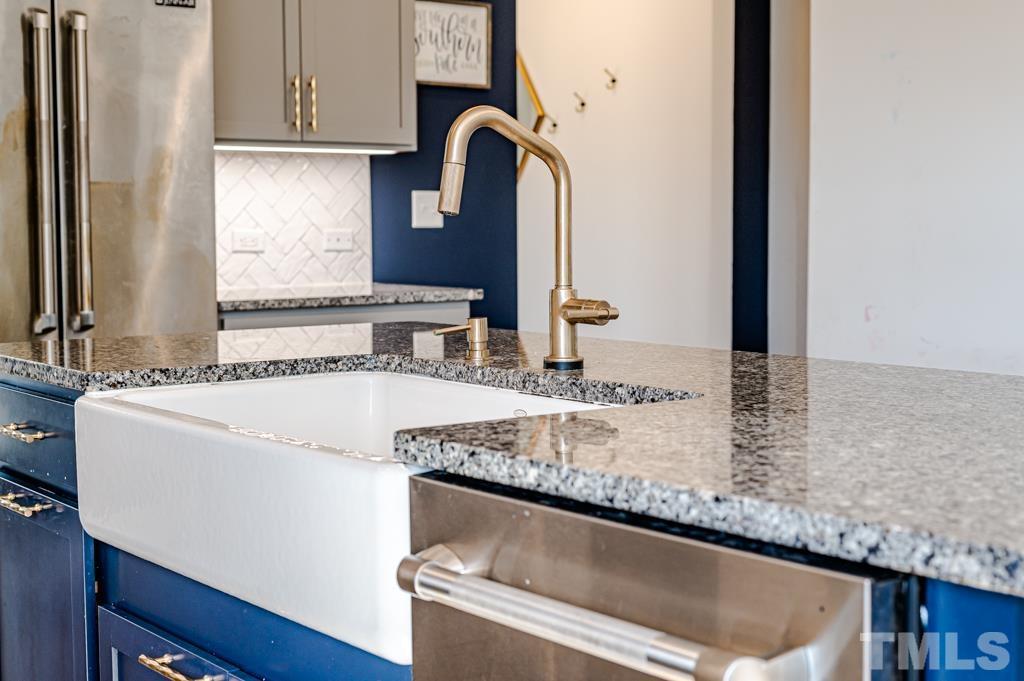 6712 Lucado Court Raleigh, NC 27603 - Photo 11 of 52 a close view of sink and tap