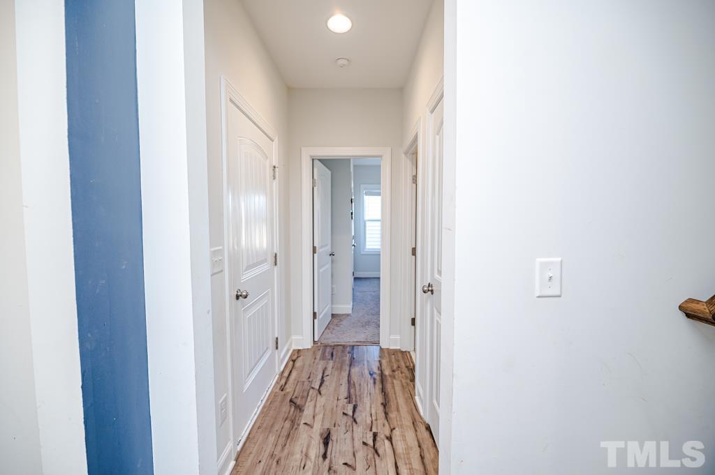 6712 Lucado Court Raleigh, NC 27603 - Photo 29 of 52 a view of a bathroom from the hallway