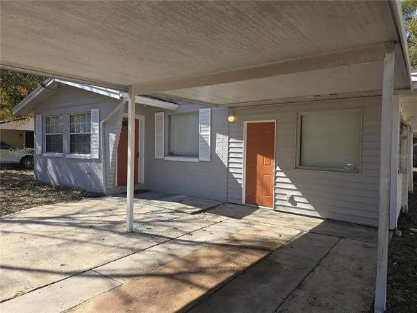 a view of a house with wooden floor and roof