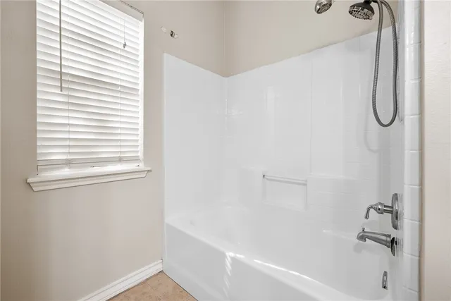 a bathroom with a bathtub