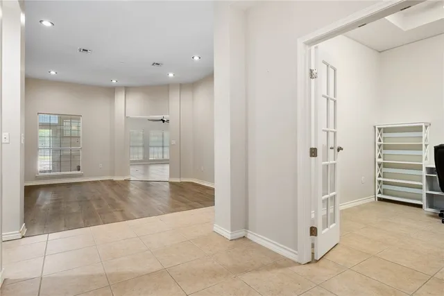 a view of a hallway with closet area