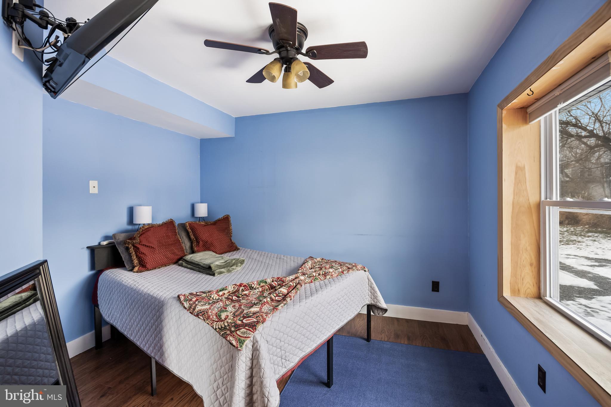28 Oregon Avenue Mount Laurel, NJ 08054 - Photo 11 of 21 a bed sitting in a bedroom next to a window