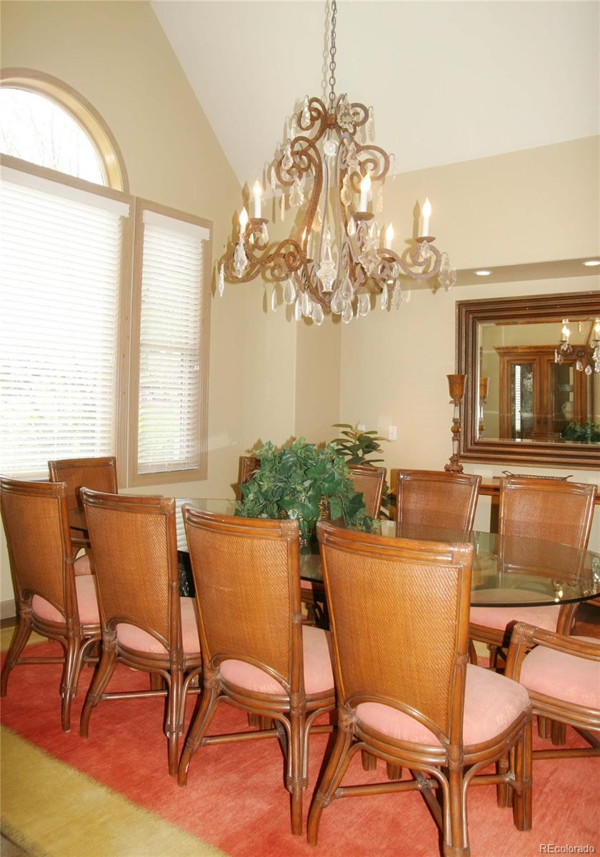 10 Shotgun Circle Edwards, CO 81632 - Photo 15 of 33 a view of a dining room with furniture a chandelier and a large window