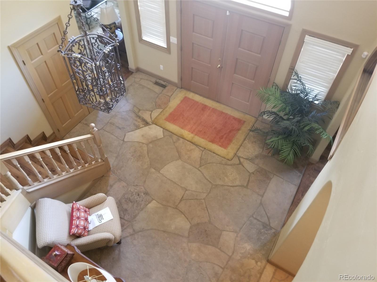 10 Shotgun Circle Edwards, CO 81632 - Photo 18 of 33 a living room with furniture and a floor to ceiling window