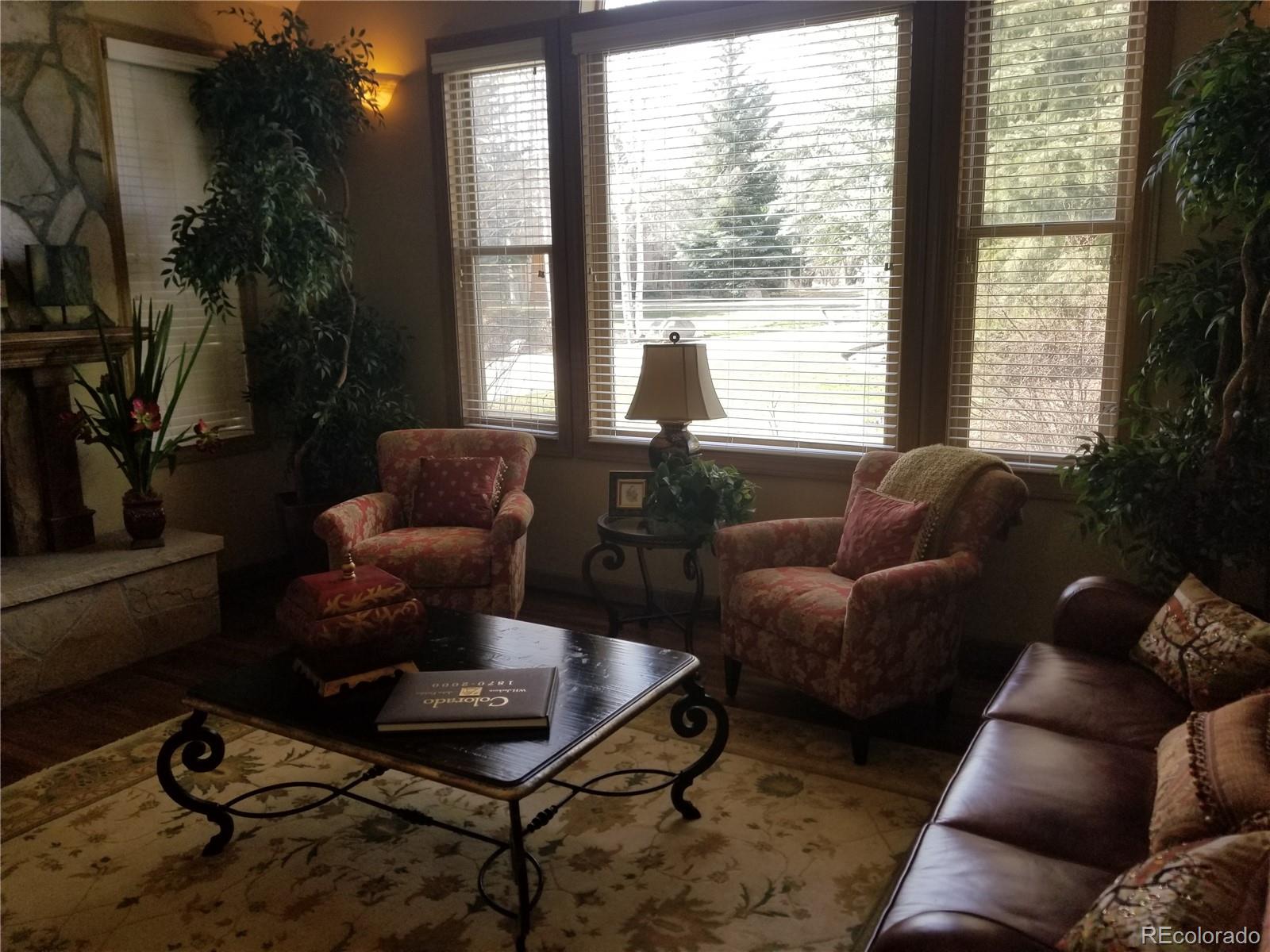 10 Shotgun Circle Edwards, CO 81632 - Photo 24 of 33 a living room with furniture and a large window
