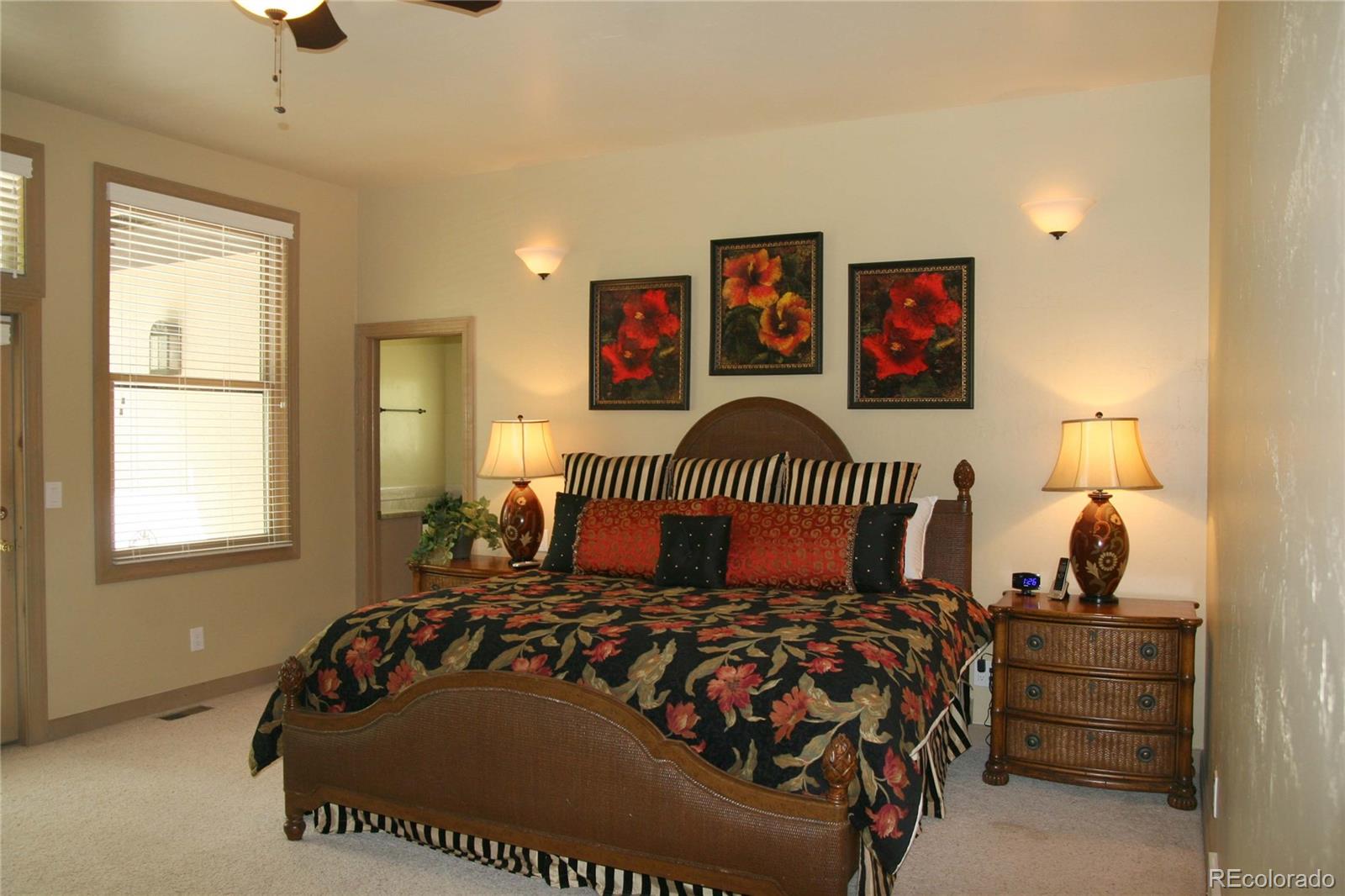 10 Shotgun Circle Edwards, CO 81632 - Photo 30 of 33 a bedroom with a bed and wooden floor