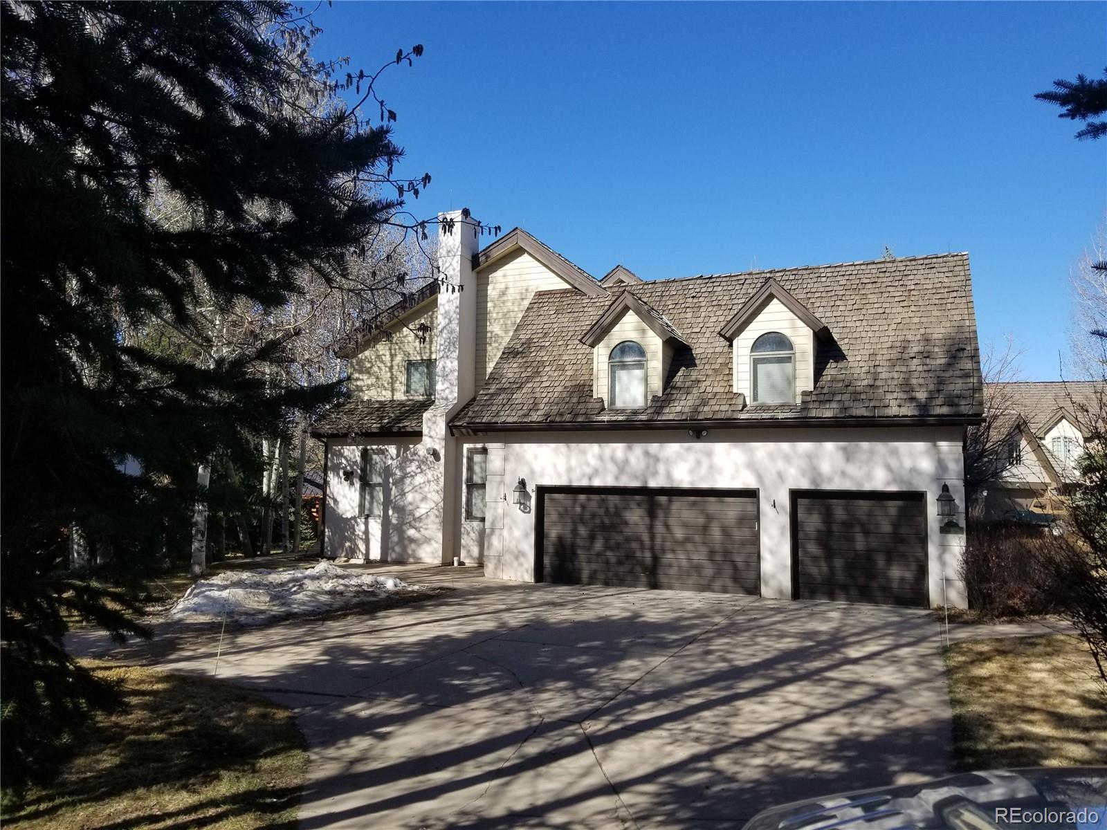 10 Shotgun Circle Edwards, CO 81632 - Photo 3 of 33 a front view of a house with a yard