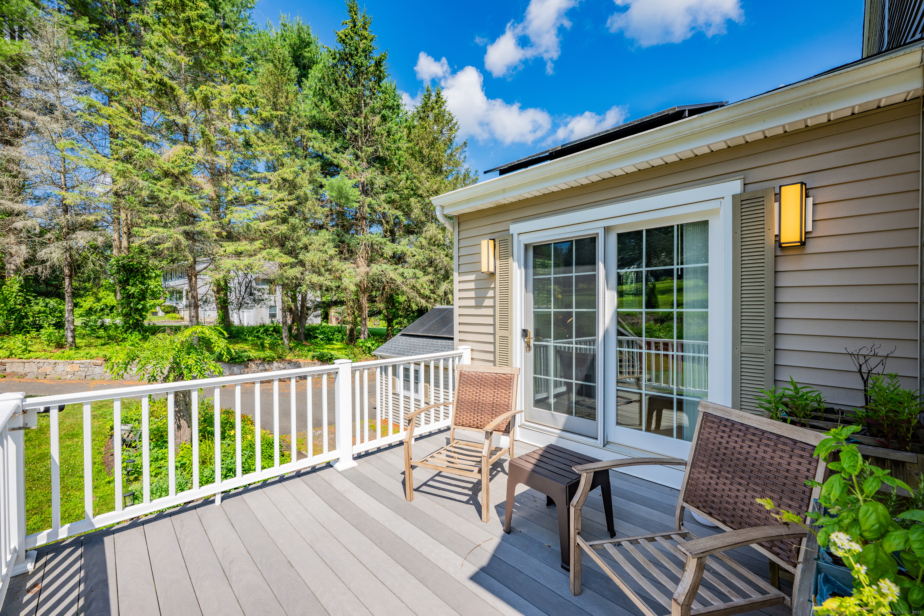21 Long Meadow Road Bethlehem, CT 06751 - Photo 11 of 32 a view of balcony with wooden floor and outdoor seating