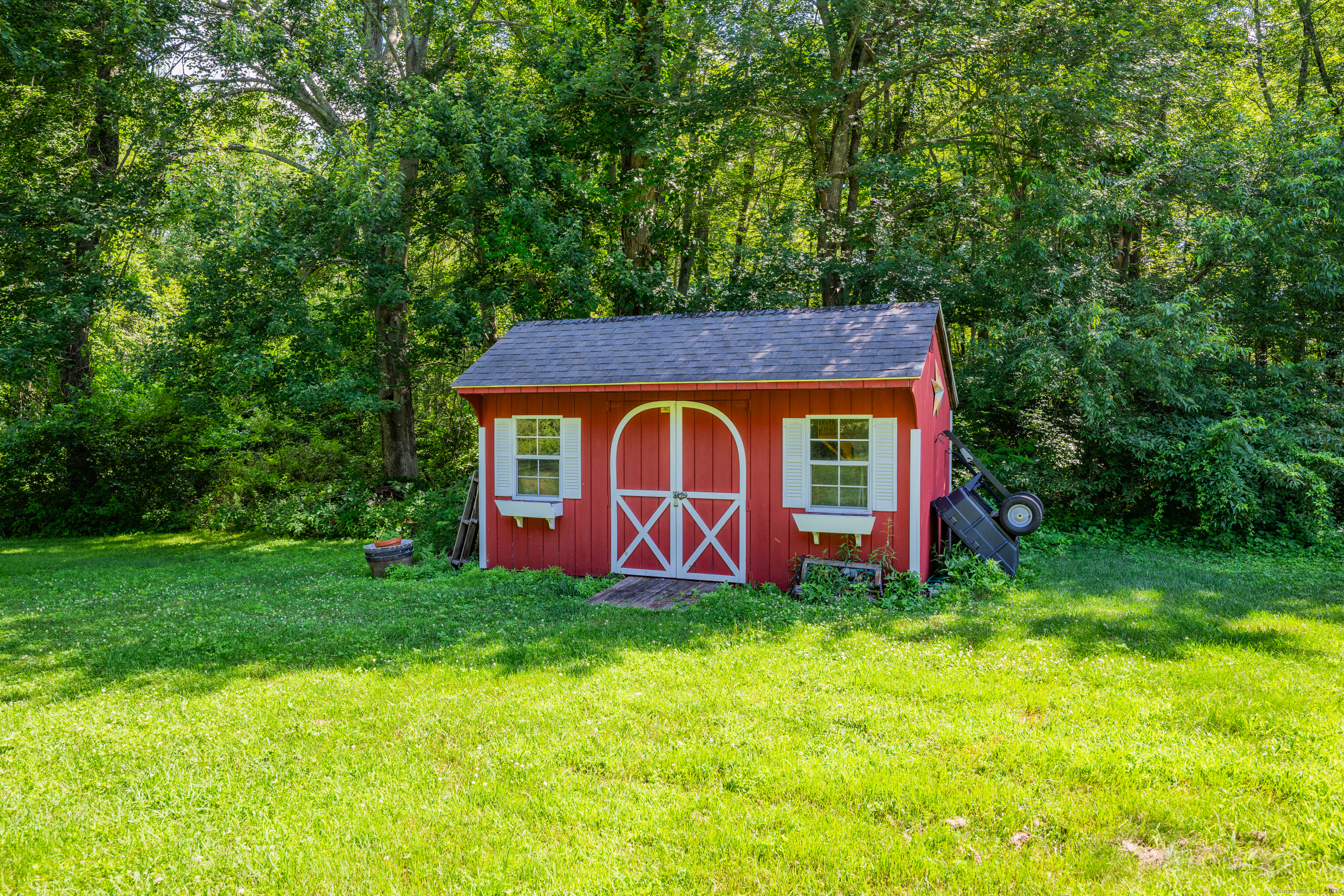 21 Long Meadow Road Bethlehem, CT 06751 - Photo 13 of 32 a view of a barn with big yard