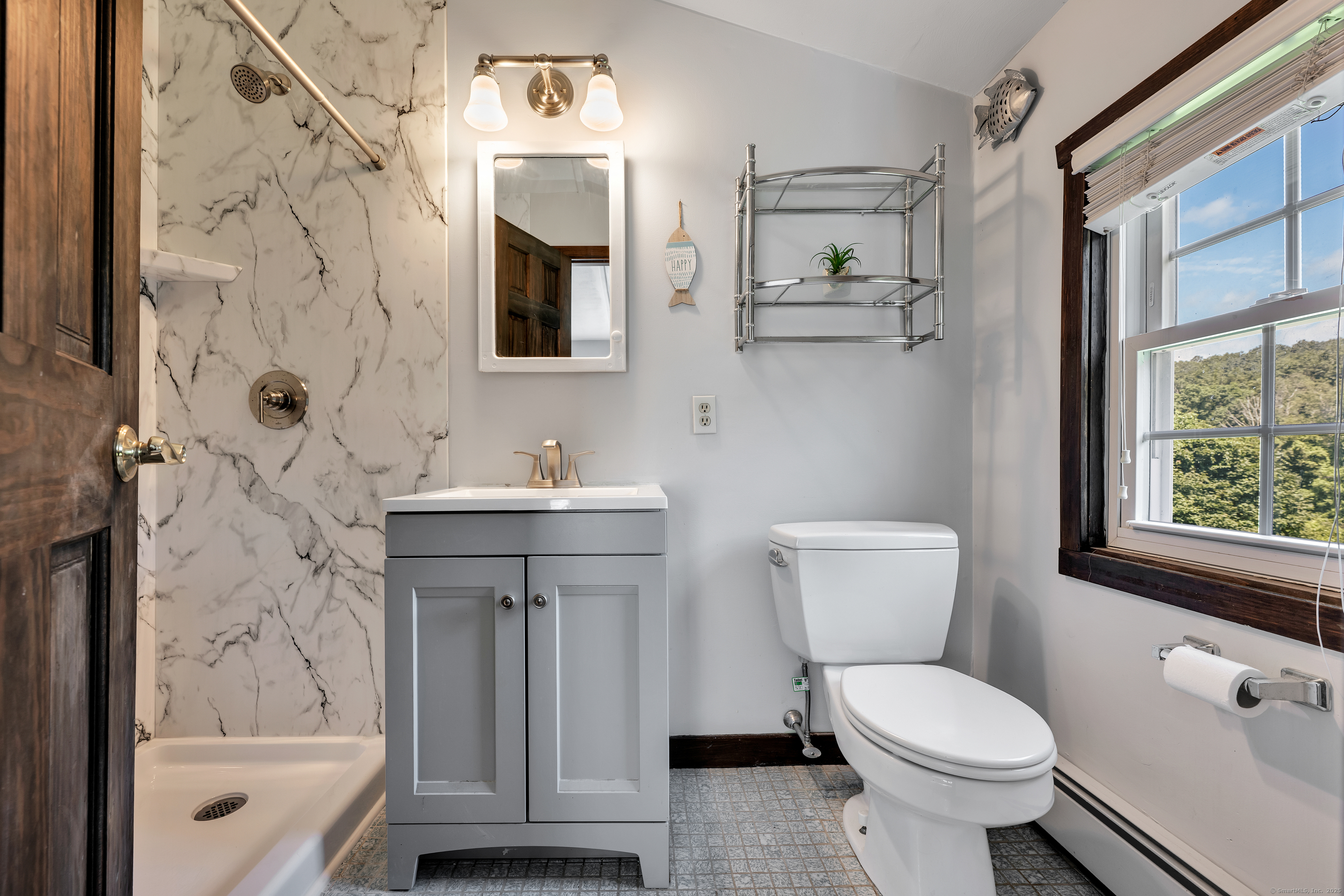 21 Long Meadow Road Bethlehem, CT 06751 - Photo 19 of 32 a bathroom with a sink toilet and shower