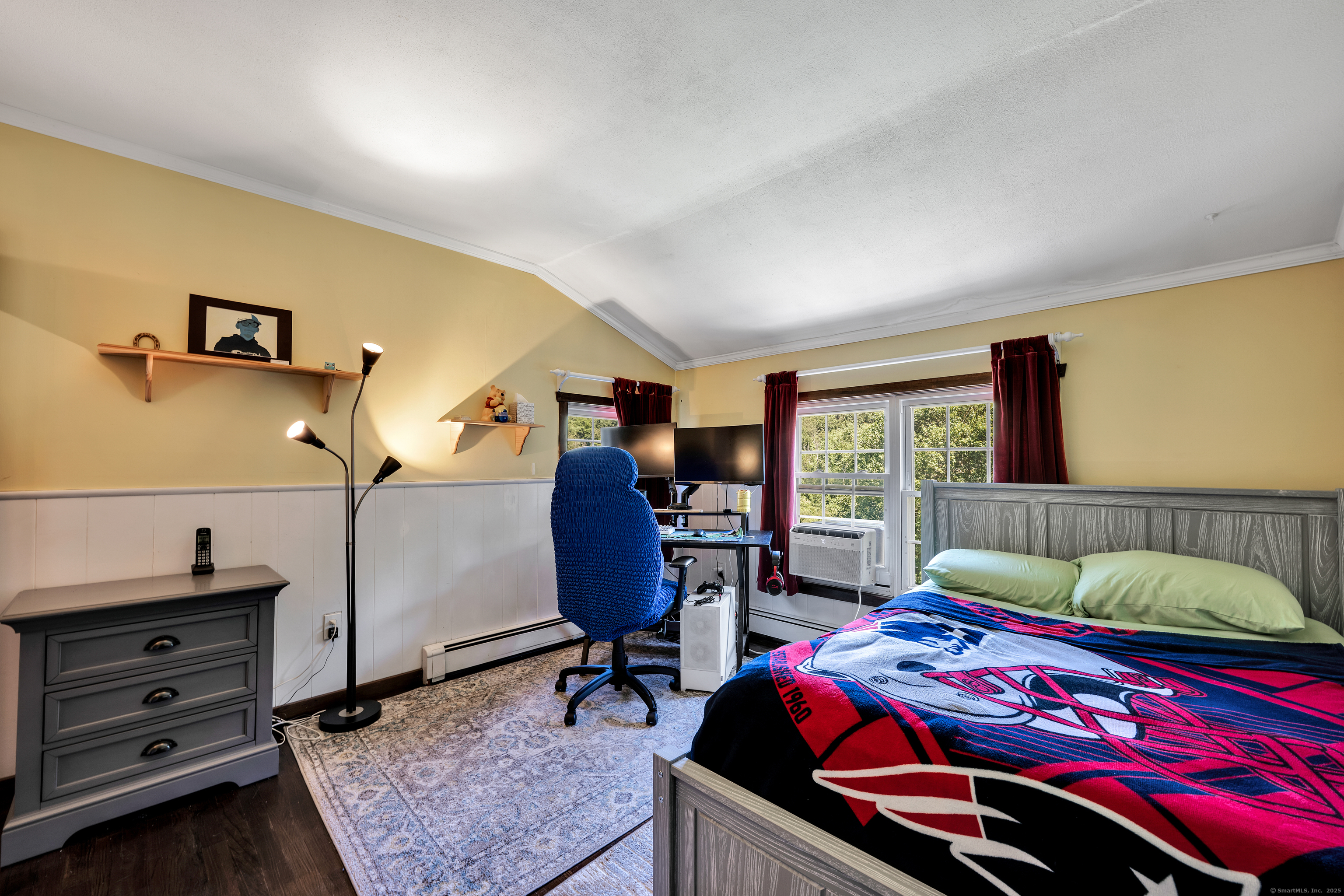 21 Long Meadow Road Bethlehem, CT 06751 - Photo 23 of 32 a bedroom with a bed and wooden floor