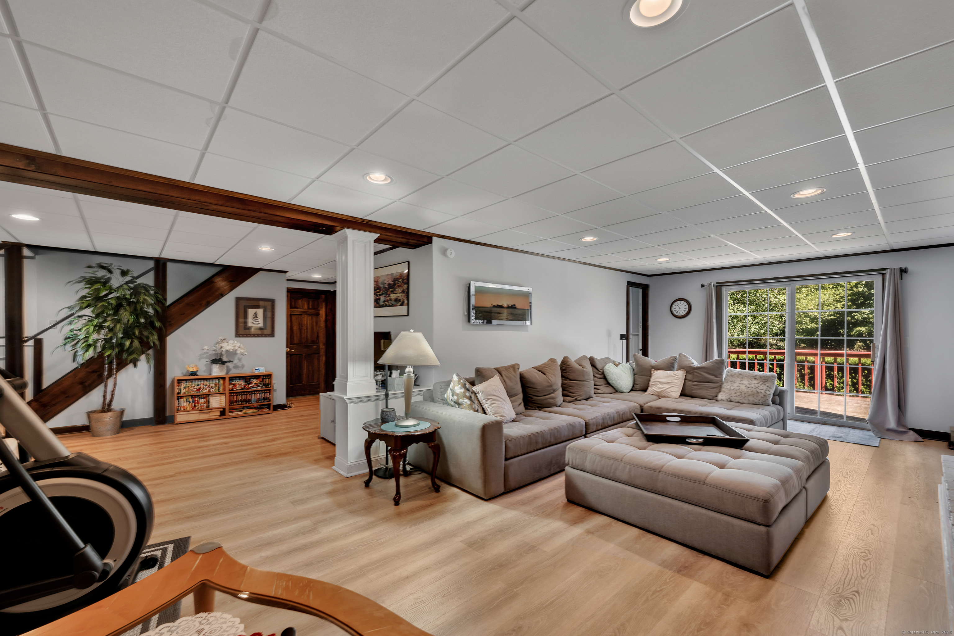 21 Long Meadow Road Bethlehem, CT 06751 - Photo 24 of 32 a living room with furniture and a large window