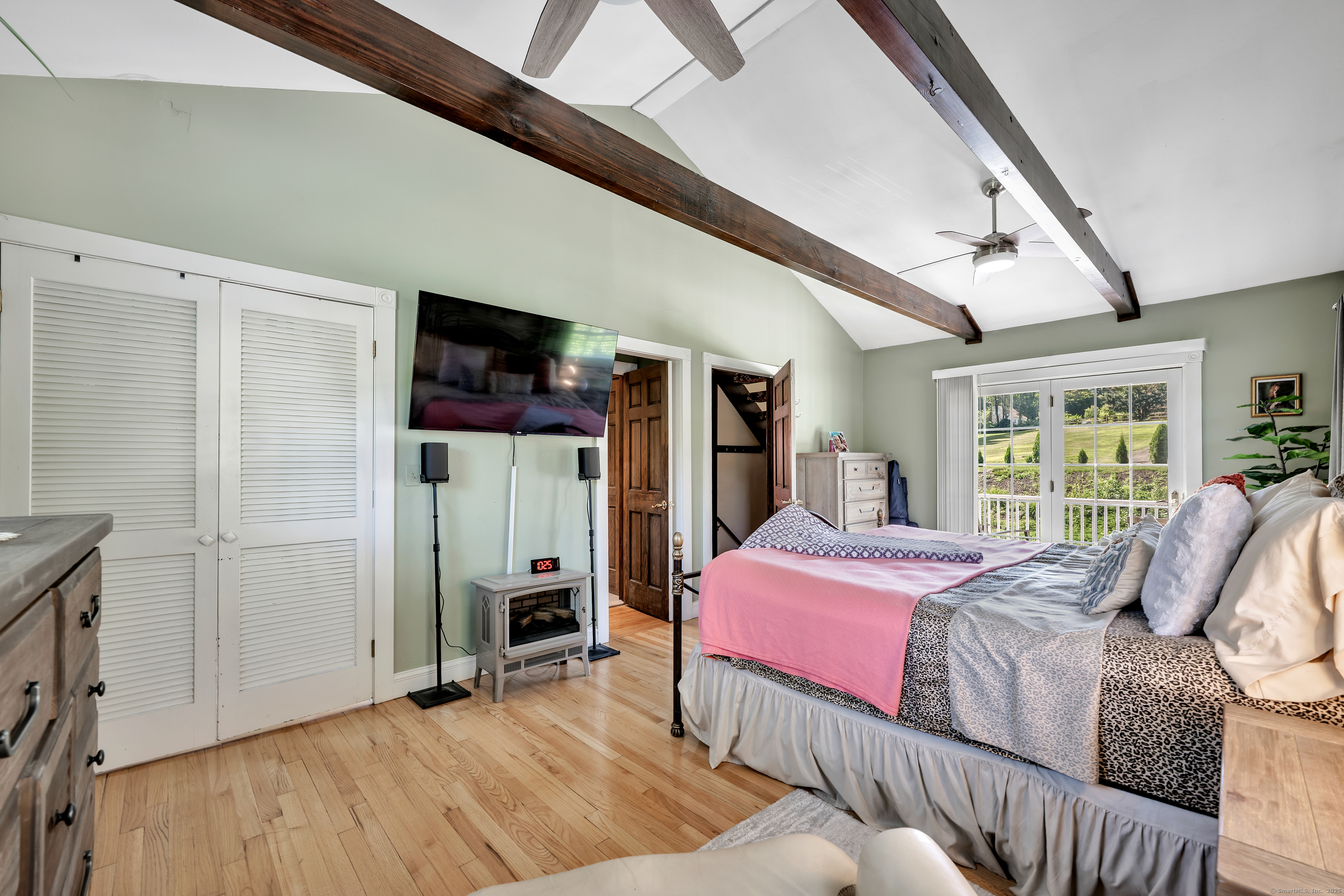 21 Long Meadow Road Bethlehem, CT 06751 - Photo 26 of 32 a bedroom with a bed closet and a window