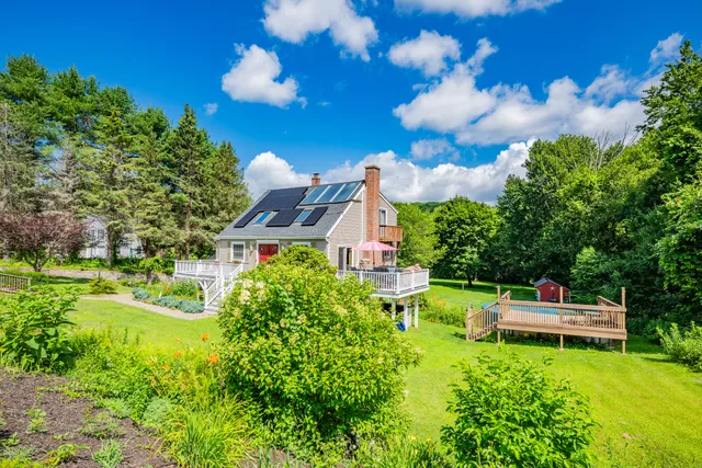 a view of a house with garden