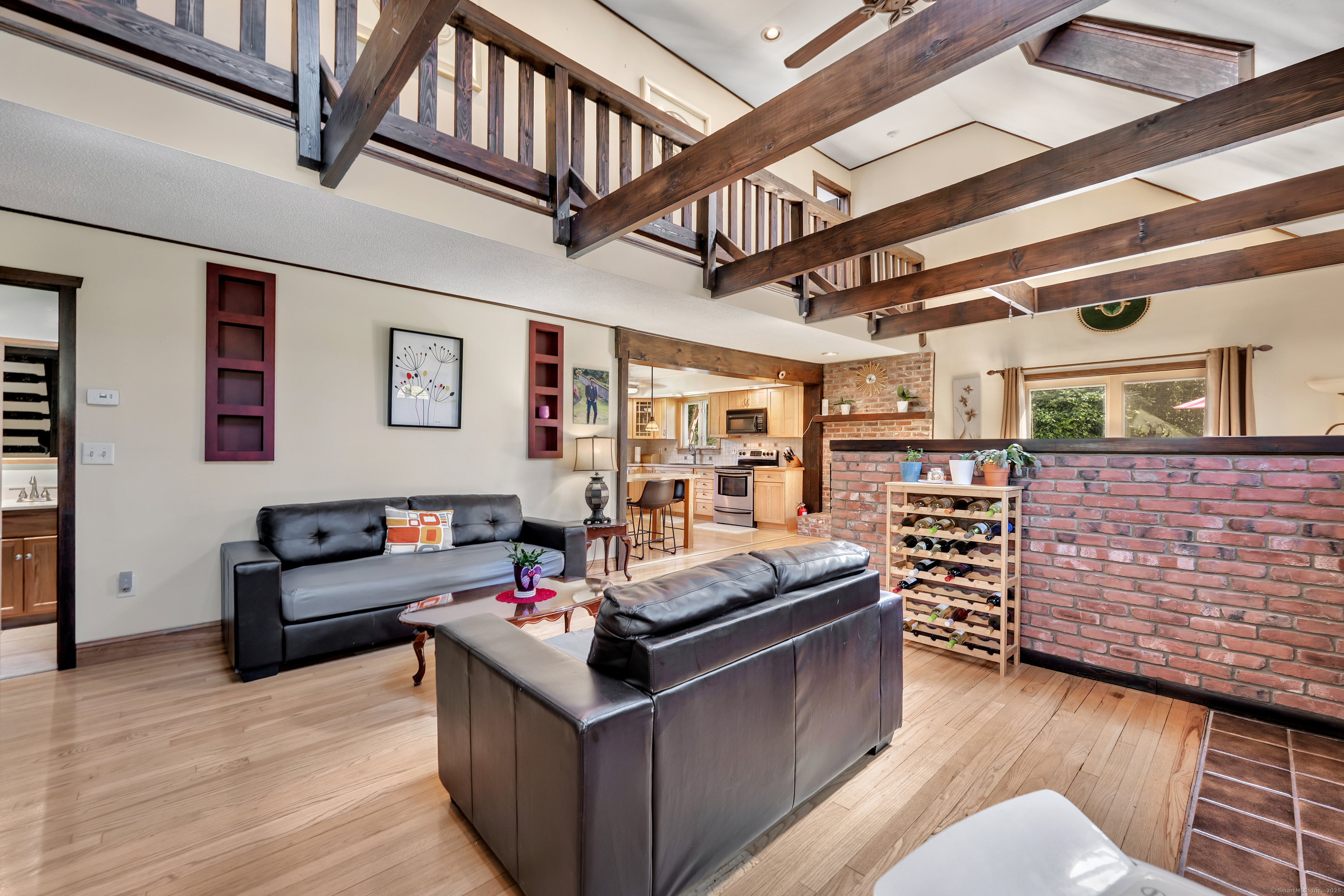 21 Long Meadow Road Bethlehem, CT 06751 - Photo 32 of 32 a living room with furniture and wooden floor