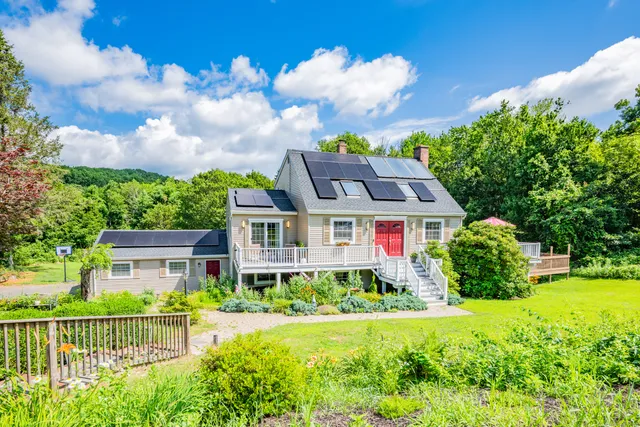 a view of deck with wooden floor and fence